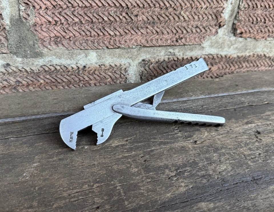 A rare 6.5" Karu German quick-adjustable wrench — a beautifully engineered piece of old-world tool-making that doubles as a desk conversation starter.