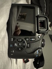 Canon T7 DSLR with 50mm lens, barely used, great condition, priced at 250.