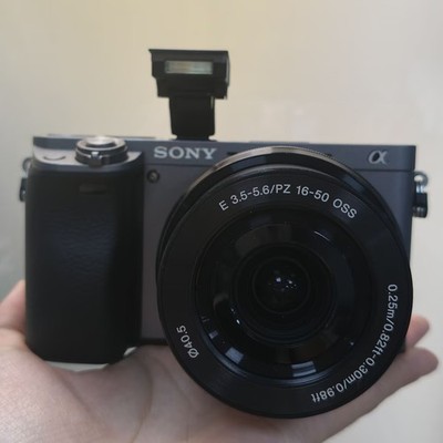 Working Sony Alpha a6000 24.3MP Digital Camera With 16-50mm OSS Lens Gray