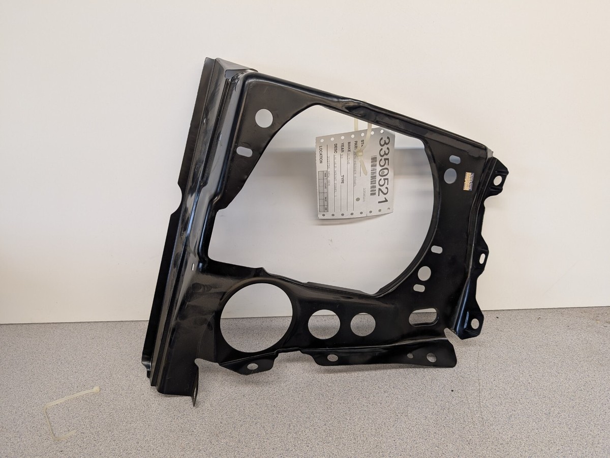 New NOS OEM Volvo 240 86-93 Left Headlight Mounting Panel 1315756