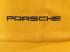 2026 PORSCHE DESIGN FANWEAR 100% COTTON YELLOW HAT W/EMBROIDERED PORSCHE LOGO.