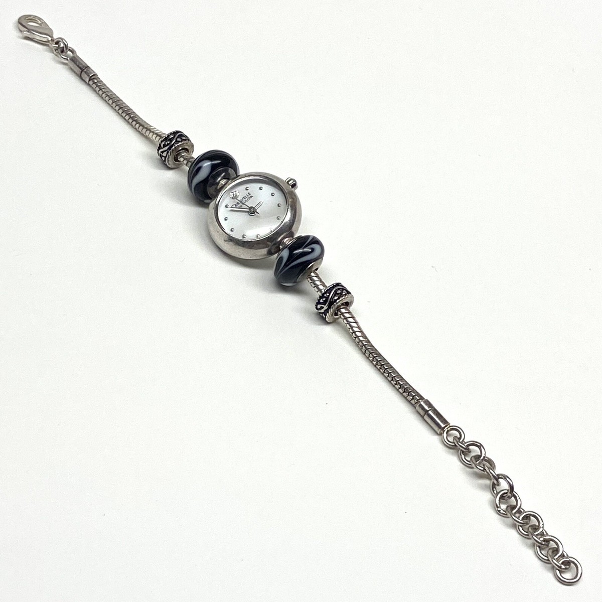 Caravelle women’s Watch, brand new never worn
Silver with opalescent face Vintage Caravelle Watch Womens Silver Tone Stainless Steel  main image 3