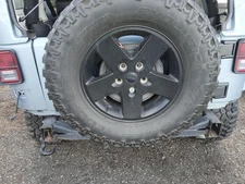 Used Wheel fits: 2012 Jeep Wrangler 17x7-1/2 5 spoke painted black Grade A