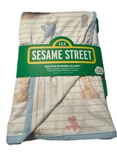 Sesame Street Characters multiuse reversible blanket. 42x42in