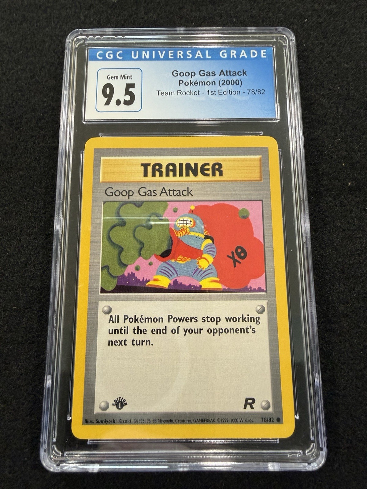Pokemon Goop Gas Attack 78/82 from Team Rocket 1st Edition in a CGC 9.5 (now 10)