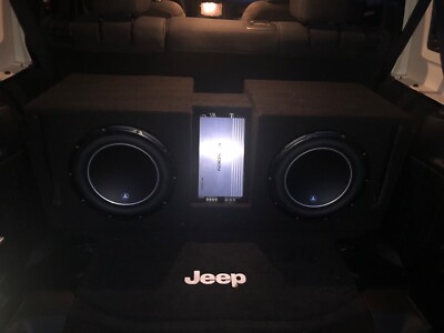 two 12inch JL Audio W6's with 2 gladen AMPs and custom box 