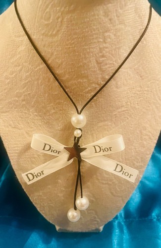 Adorable Repurposed Dior Rockstar Bow cord necklace with pearls