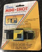 Rare 110 Camera Mini-Shot with key chain and coin holder (world's smallest)