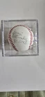 Autographed Baseball/Juan Marichal, Manny Mota, And More. No COA.