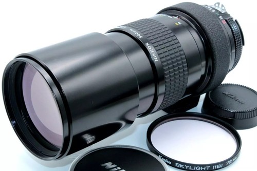 Téléobjectif Nikon Ai-s Nikkor 200mm F/4 AIS MF - Occasion Bouchons + Filtre