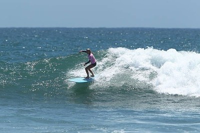 Surfer Mary Osborne surfs during the 3rd Annual Project SOS SURF 2- Old Photo 6