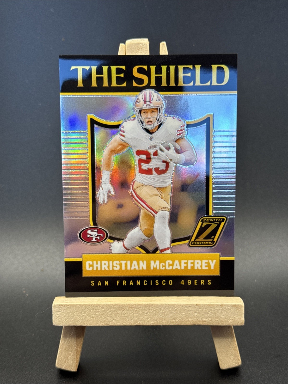 Christian McCaffrey SSP 2024 Panini Zenith The Shield Silver Prizm Case Hit