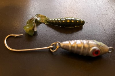 2 - 1.75 OZ SILVER & GREEN TORPEDO JIGS WITH A BLK/GRN CURLY TAIL GRUB