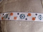 LZ ANTIQUE BRAID EMBROIDERY FIELD FLOWERS.  50MM sold by the meter