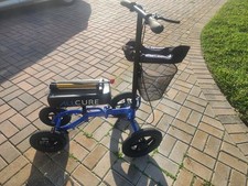 Knee Walker with basket in excellent condition including air pump