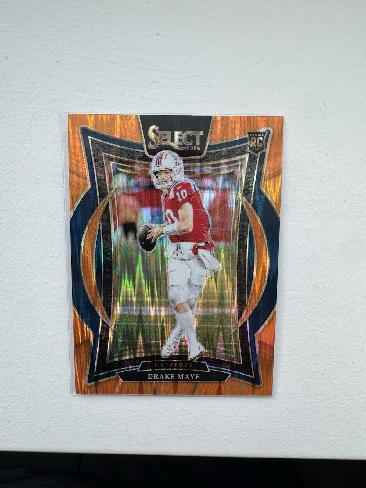 2024 Panini Select - Concourse Drake Maye #27 Orange Shock Prizm /499 (RC)