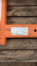 Barrel lifter attachment for use with fork lift