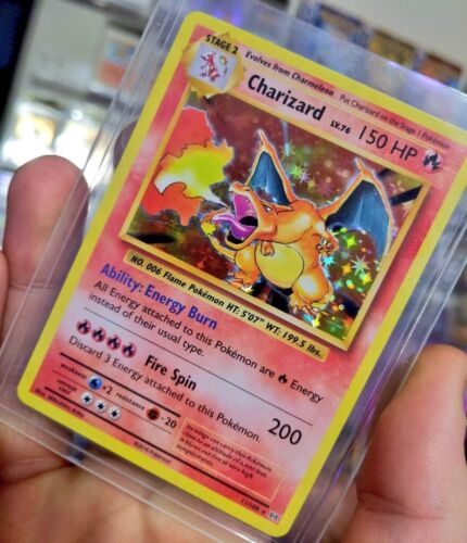 Sold at Auction: 2016 Pokemon Charizard XY Evolutions #11/108 Holo