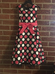 pink dress with black dots