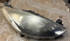 Mazda 2 - 2007-2014 - o/s-driver headlight black - breaking - 337