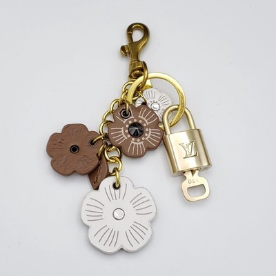 Authentic Louis Vuitton Lock & Key with unbranded Flower Bagcharm