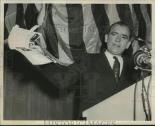Press Photo Senator McCarthy shows paper attacking Governor Stevenson.