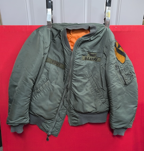 Vietnam War US sage green and orange flight jacket 1st cavalry size small 1964