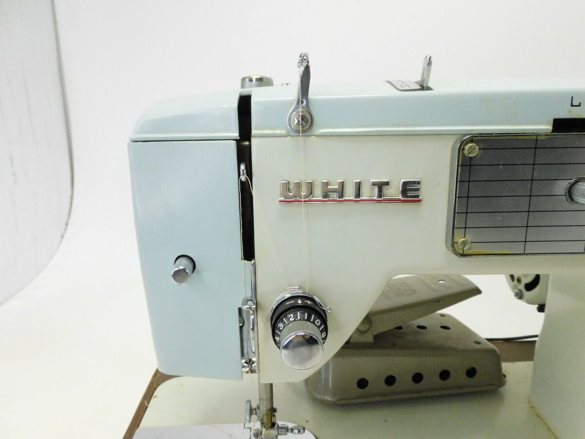 Vintage White Zig-Zag Sewing Machine White and Light Blue Vintage White Zig-Zag Sewing Machine White and Light Blue