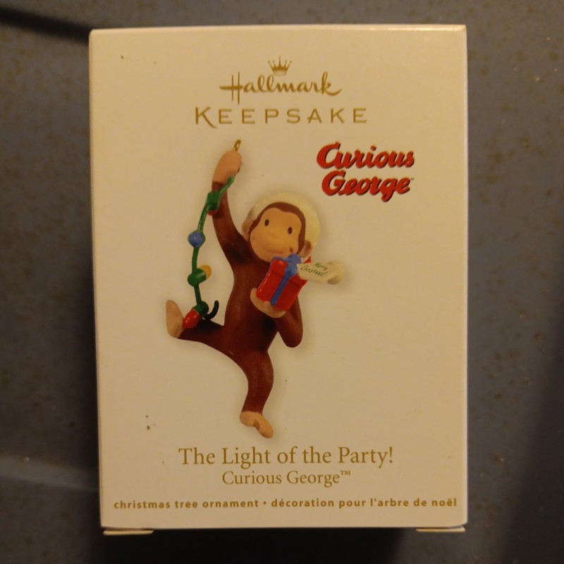 2012 Hallmark Keepsake Curious George Ornament “The Light Of The Party!”