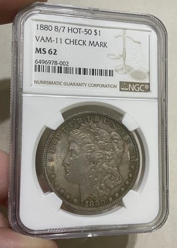 U.S. - 1880 8/7 Silver Morgan Dollar (NGC MS 62 - VAM-11 Check Mark, Hot 50)