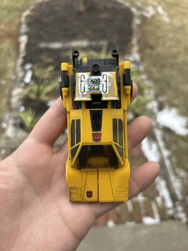 vintage 1984 Hasbro Generation 1 (G1) Transformers Sunstreaker action figure.