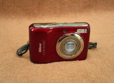 nice red Nikon Coolpix L20 compact digital camera with card - 10.0 megapixels