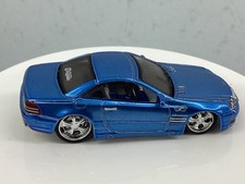 MAISTO AMG PLAYERZ MERCEDES-BENZ SL 55 AMG--AZUL--BASE DE METAL-NEUMÁTICOS DE GOMA 5A21