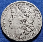 A 1897 O MORGAN SILVER DOLLAR