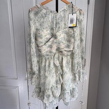Green and white floral mini dress