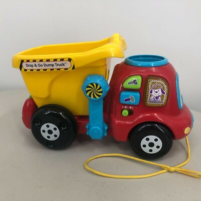 VTech Drop And Go Dump Truck 2 Boulders Lights Sounds Phrases Colors Numbers