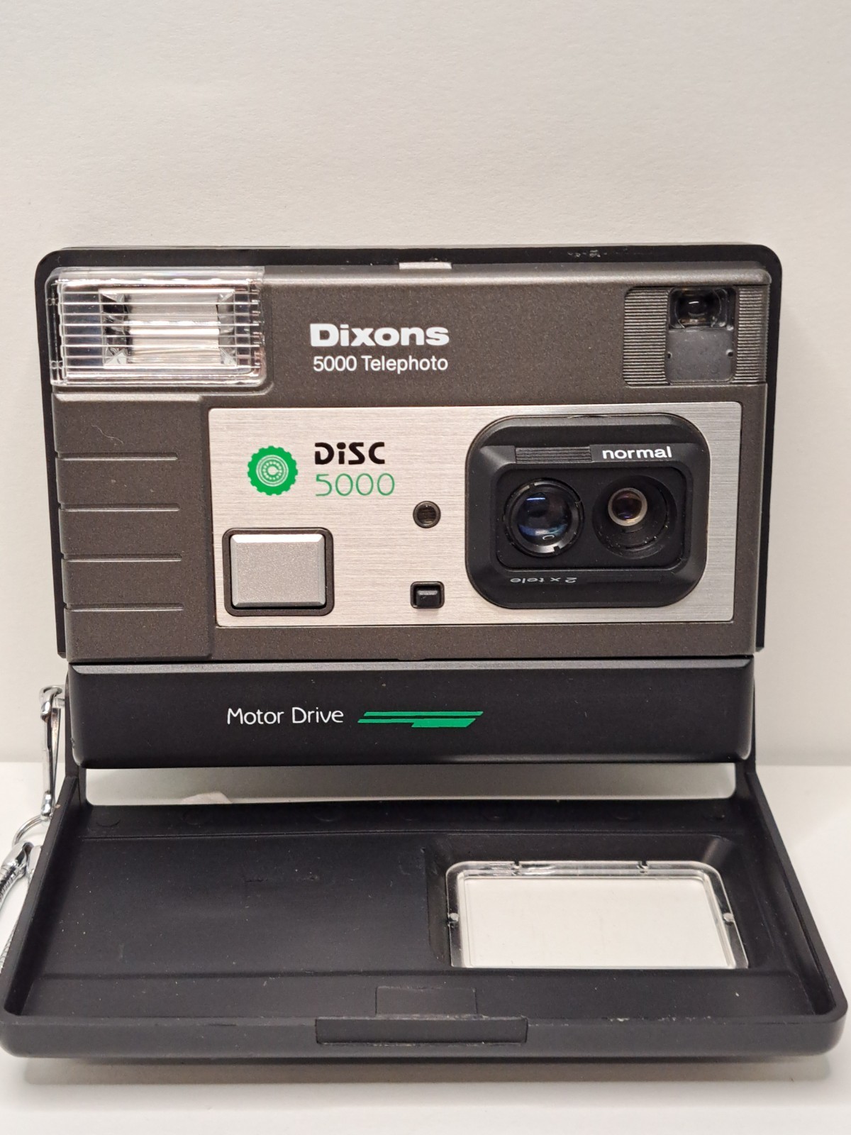 Vintage Dixons 5000 Telephoto Motor Drive Disc Camera. Good condition. Works.