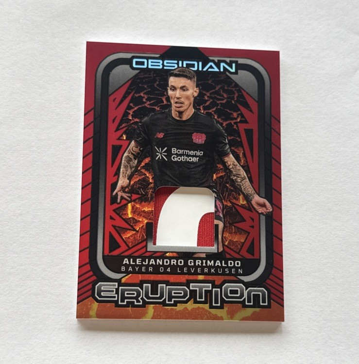 ALEJANDRO GRIMALDO 2025-26 PANINI OBSIDIAN ERUPTION RED FLOOD JERSEY 6/10