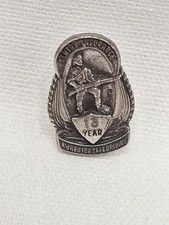 Pin giratorio de solapa de premio Sentry Insurance Safe Driving Award de colección.