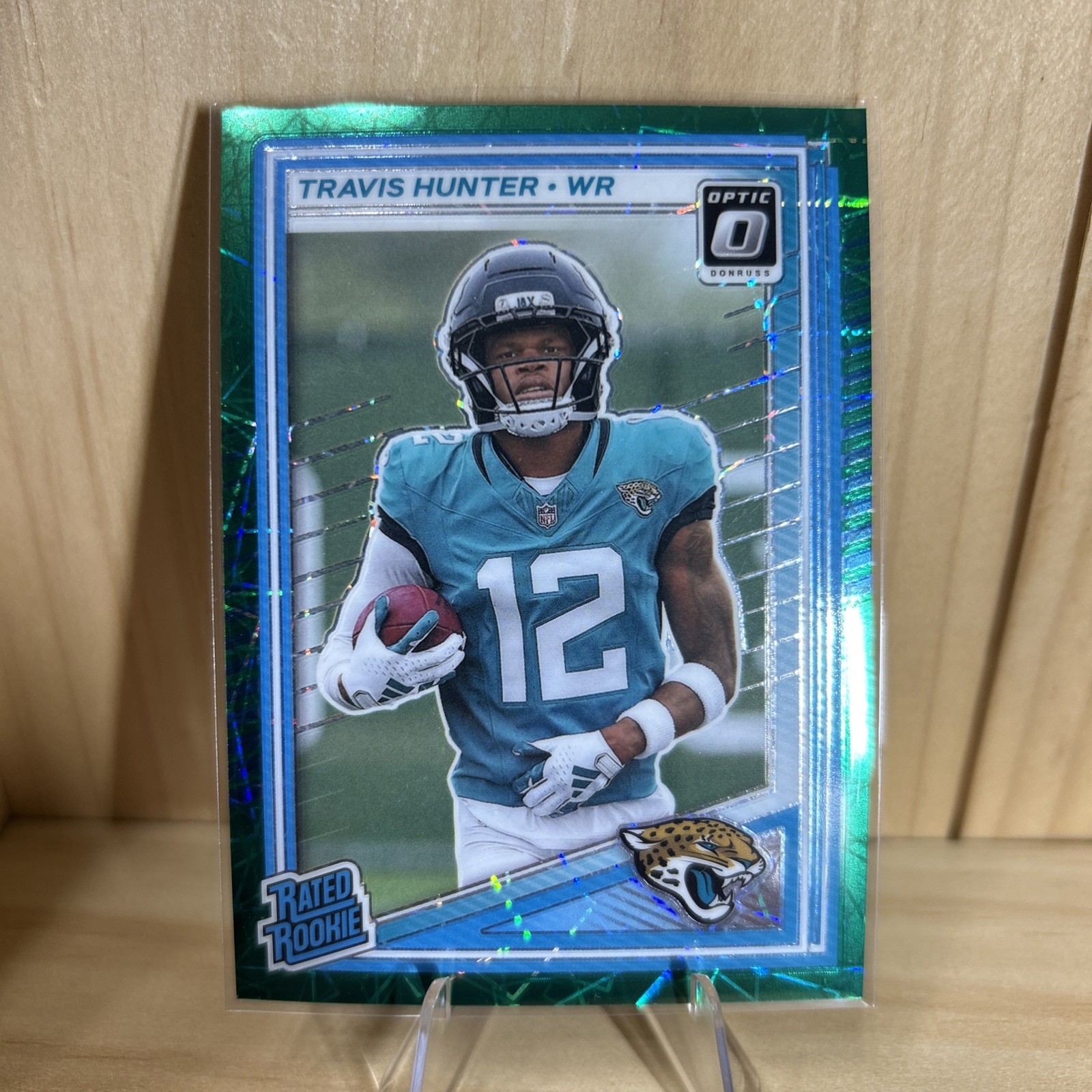 2025 Panini Optic - Rated Rookie Travis Hunter #201 Green Velocity Prizm (RC)