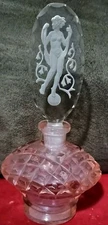 Czechoslovakian Art Deco Pink Perfume Bottle. Intaglio Design Of A Woman 