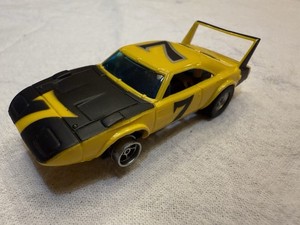 AFX HO Scale Slot Car #7 Yellow/Black Race Car w/ Rear Wing