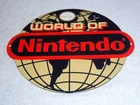 VINTAGE WORLD OF NINTENDO 12" METAL MARIO BROTHERS NES 64 SNES GASOLINE OIL SIGN