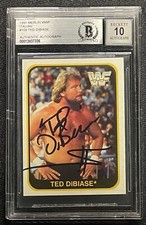 TED DIBIASE SIGNED 1991 MERLIN WWF #109 BECKETT AUTO GRADE 10 MILLION DOLLAR MAN