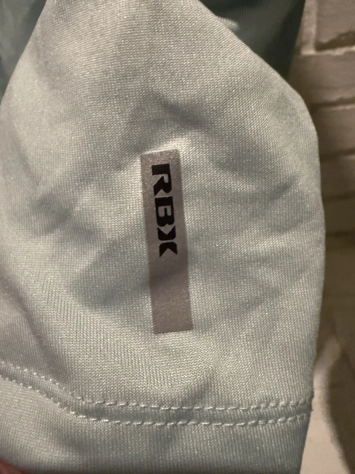 Sudadera con capucha ligera RBX azul cielo talla mediana para mujer manga larga Foto 2 de 4