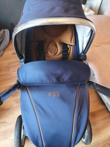 egg pram navy and tan