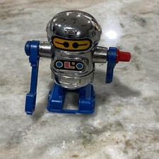 Vintage 1979 Tomy Wind-Up Walking Robot Toy Rotating Arms Blue Silver Works