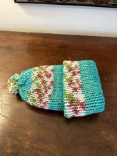 Beanie With Colorful Borders A Fluffy Pom