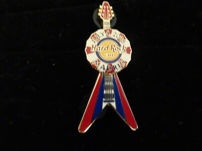 Hard Rock Cafe pin Madrid 4th of July 2006 Flying V Guitar Red White Blue ribbon