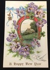 LOVELY UNUSED VTG EMBOSSED NEW YEAR PC, PURPLE VIOLETS, HORSESHOE, COTTAGE SCENE — photo 1